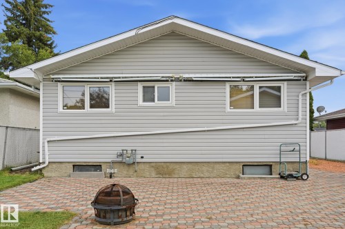Light gray horizontal siding exterior with a gabled roof - 13304 63 Street Nw, Edmonton, AB 