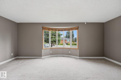 Bay window with wood-finish trim - 13304 63 Street Nw, Edmonton, AB 