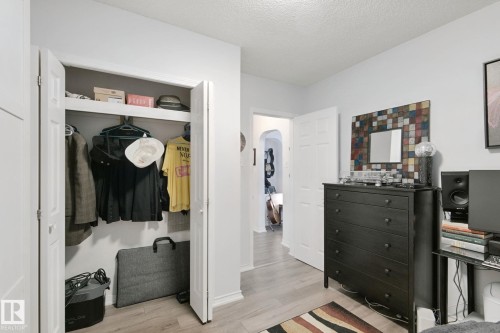 Integrated closet with bi-fold doors - 12035 83 Street Nw, Edmonton, AB 