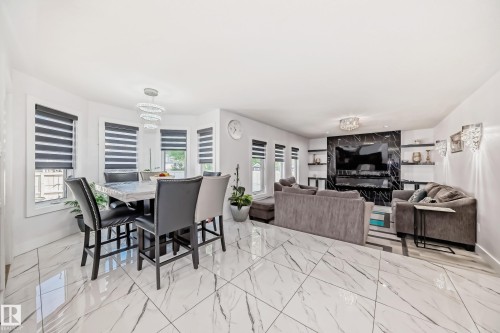 White tile flooring with dark gray veining throughout - 4608 43 Avenue Nw, Edmonton, AB 