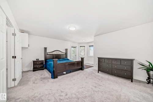 Plush carpet flooring, neutral wall tones, and recessed lighting - 4608 43 Avenue Nw, Edmonton, AB 