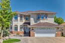 Two-story residence featuring light-toned siding and brick accents - 4608 43 Avenue Nw, Edmonton, AB 