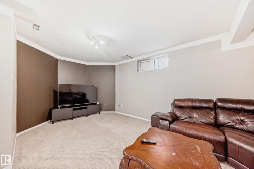 Recessed window, textured ceiling, and neutral-toned walls - 4608 43 Avenue Nw, Edmonton, AB 
