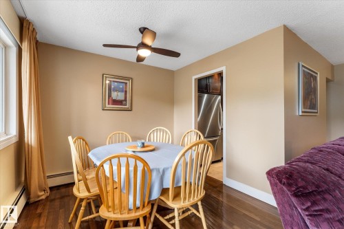 Wood-finish flooring with a smooth finish - #205 8125 110 St Nw, Edmonton, AB 