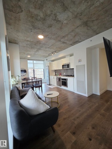 Exposed concrete ceiling with recessed lighting - #1006 1010 6 St Sw, Calgary, AB 