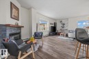 #704 9707 105 St Nw, Edmonton, AB  - Indoor Photo Showing Living Room With Fireplace 