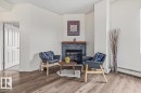 #704 9707 105 St Nw, Edmonton, AB  - Indoor Photo Showing Other Room With Fireplace 