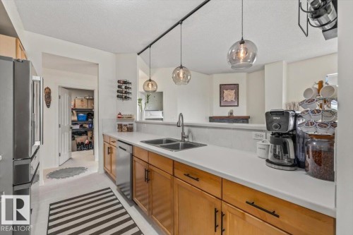#704 9707 105 St Nw, Edmonton, AB - Indoor Photo Showing Kitchen With Double Sink