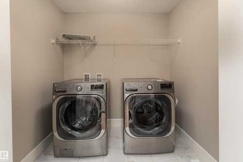 3301 Abbott Crescent Sw, Edmonton, AB - Indoor Photo Showing Laundry Room