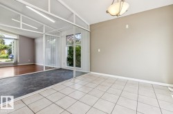 View of solarium from dining room. - 