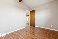 2nd bedroom top floor with vaulted ceiling. - 