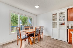 White display cabinetry with glass panel doors - 