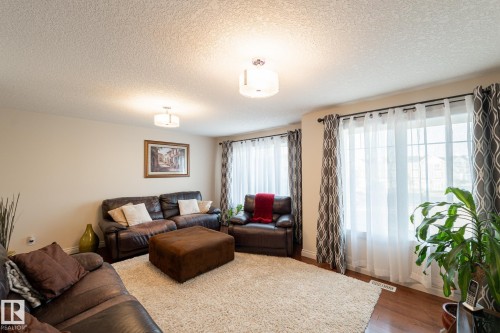 Hardwood-style flooring throughout - 914 Crystallina Nera Way Nw, Edmonton, AB 