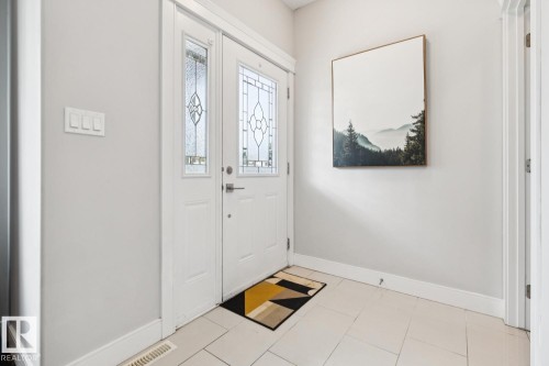 Double entry doors with decorative glass panels - 9919 79 Street Nw, Edmonton, AB 