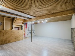 Wood-finish flooring with a decorative wood-slat ceiling - 