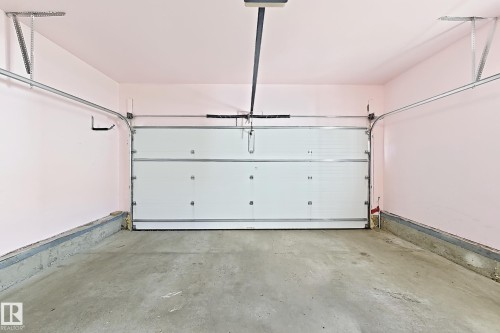 Concrete flooring with painted walls - 3015 37 Street Nw, Edmonton, AB 
