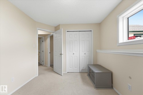 Neutral-toned walls with carpeted flooring - 1709 Turvey Bend Bend Nw, Edmonton, AB 