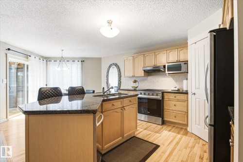 24 Everwood Close, St. Albert, AB - Indoor Photo Showing Kitchen With Stainless Steel Kitchen With Double Sink