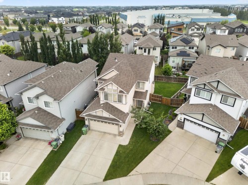 Two-story residence with a light-colored exterior and gabled rooflines - 6504 48 Avenue, Beaumont, AB - Outdoor