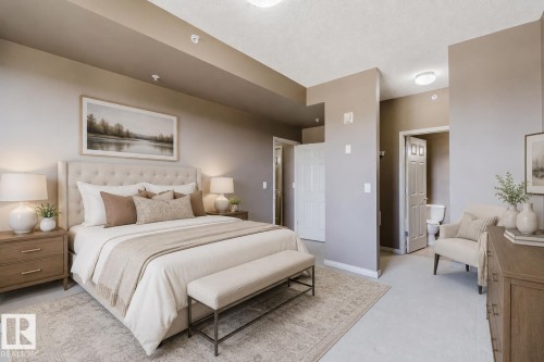 Neutral wall tones with overhead lighting and carpet flooring - #1-405 4245 139 Av Nw, Edmonton, AB 