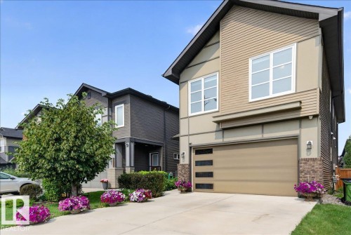 Modern two-story exterior with horizontal siding and brick accents - 2709 Collins Crescent Sw Sw, Edmonton, AB - Outdoor With Facade