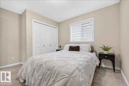 Room with light tan walls and beige carpet flooring - 2709 Collins Crescent Sw Sw, Edmonton, AB - Indoor Photo Showing Bedroom