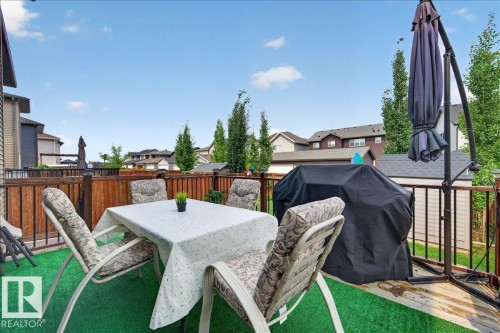 Elevated wooden deck with a privacy fence - 2709 Collins Crescent Sw Sw, Edmonton, AB - Outdoor With Deck Patio Veranda
