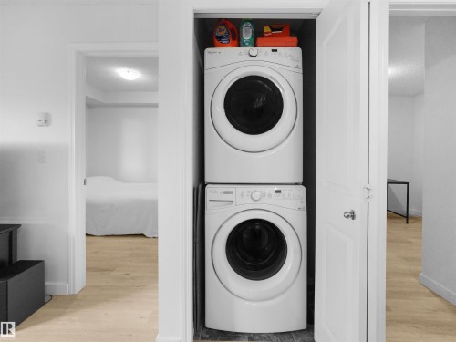 Stackable washer and dryer within a dedicated closet - #114 12035 22 Av Sw, Edmonton, AB 