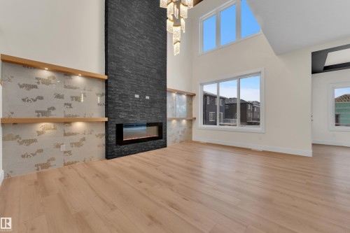 8450 Mayday Link Sw, Edmonton, AB - Indoor Photo Showing Living Room With Fireplace