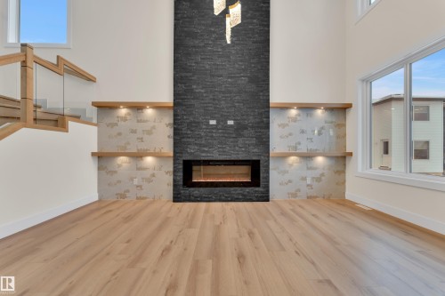 8450 Mayday Link Sw, Edmonton, AB - Indoor Photo Showing Living Room With Fireplace