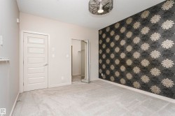 Accent wall with patterned wallpaper - 
