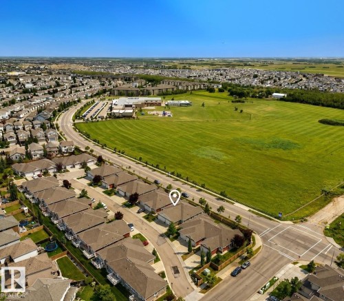 Residential neighborhood featuring a large green space and established streetscapes - #9 175 Mcconachie Dr Nw, Edmonton, AB 