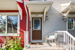 Siding exterior with contrasting red and gray panels - 
