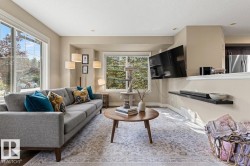 Recessed lighting, wood-finish flooring, and large windows - 