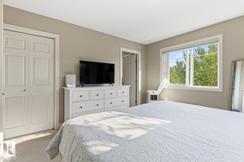Wall-to-wall carpeting and a large window - 5319 3 Avenue Sw, Edmonton, AB 
