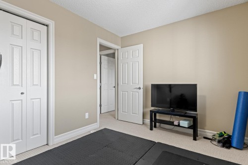 Interior space with neutral wall color and white trim - 5319 3 Avenue Sw, Edmonton, AB 