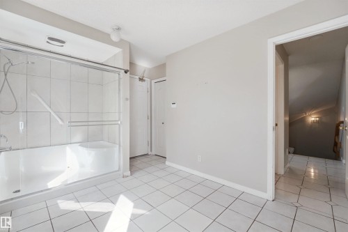 White tiled flooring throughout - 5107 17 Avenue Nw, Edmonton, AB 