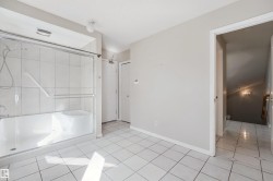 White tiled flooring throughout - 