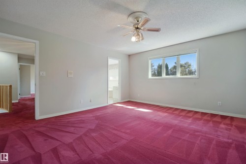 Recessed lighting, ceiling fan, bright overhead lighting, large window, and light-toned wall paint - 5107 17 Avenue Nw, Edmonton, AB 