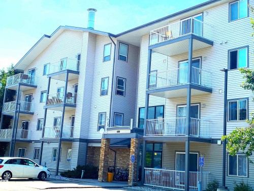 #105 155 Edwards Dr Sw, Edmonton, AB - Outdoor With Balcony With Facade