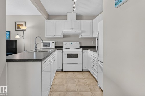 #47 16823 84 St Nw, Edmonton, AB - Indoor Photo Showing Kitchen With Double Sink