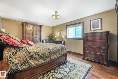 Hardwood flooring, recessed window, ceiling-mounted light fixture, and neutral wall tones - 12827 150 Avenue Nw, Edmonton, AB 