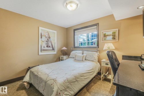 Recessed window with dark trim - 12827 150 Avenue Nw, Edmonton, AB 