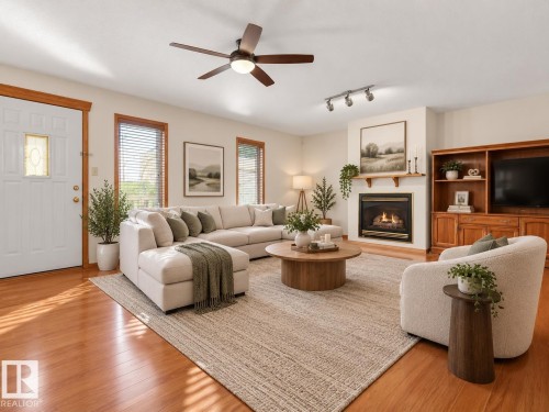AI GENERATED PHOTO - Located on the thrid level. Wood-finish flooring, ceiling fan, multiple windows with blinds, built-in fireplace, and built-in wood cabinetry - 535 Pardee Bay Nw, Edmonton, AB 