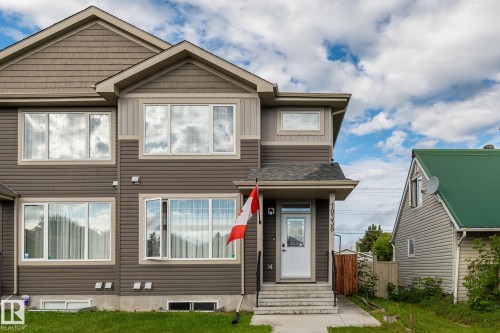 Two-story exterior with horizontal siding and shingle accents - 10338 162St Nw, Edmonton, AB 