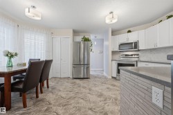 View of open-concept kitchen with breakfast area - 