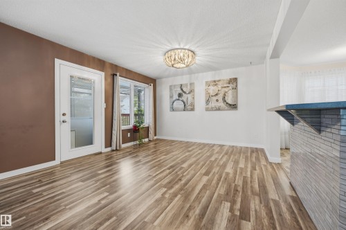 View from the living room of the open-concept main floor plan - 6910 158A Avenue Nw, Edmonton, AB 
