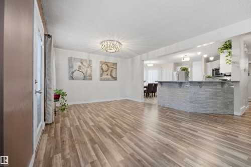 View from the living room of the open-concept main floor plan - 6910 158A Avenue Nw, Edmonton, AB 