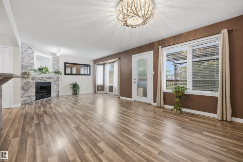 View from the dinette of the open-concept main floor plan - 6910 158A Avenue Nw, Edmonton, AB 