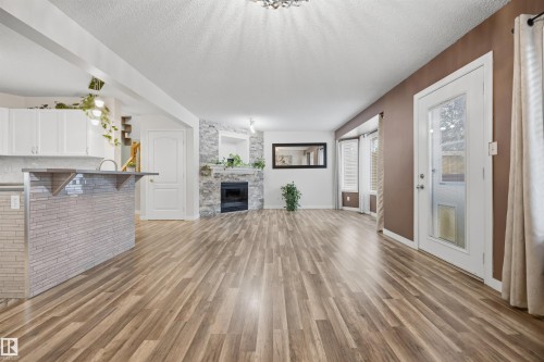 View from the dinette of the open-concept main floor plan - 6910 158A Avenue Nw, Edmonton, AB 